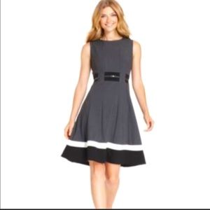 Look at her go! Fun color-blocked full skirt dress